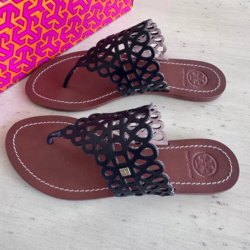 Tory Burch Navy “Davy Flat” Laser-Cut Leather Thong Sandals with Brown Footbed - Picture 2 of 6